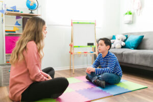 behavior analysts interacting with child patient, meeting education requirements