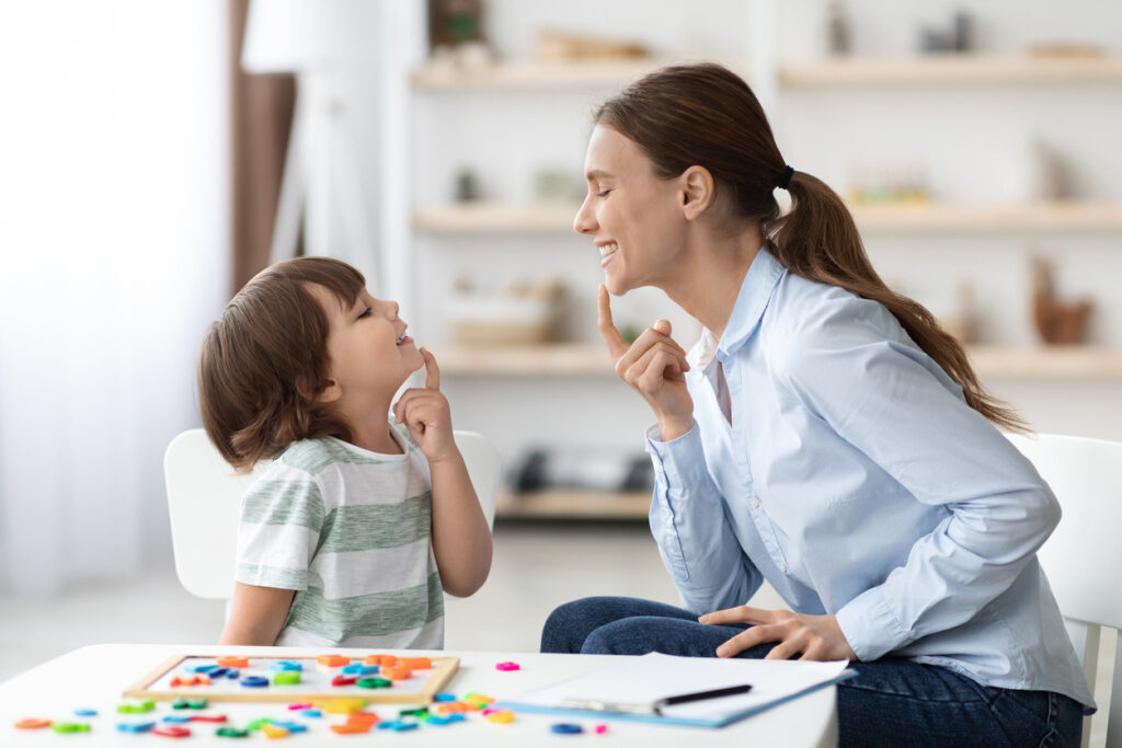 professional woman training with little boy