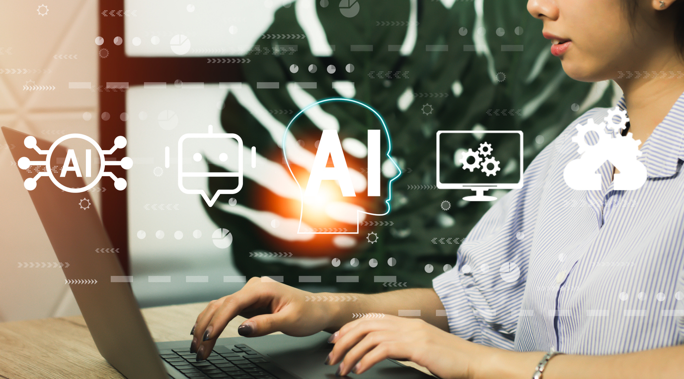 A female behavior analyst uses AI tools for instant data analysis in her office.